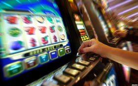 Mobile view of okpcso casino section with game categories on screen